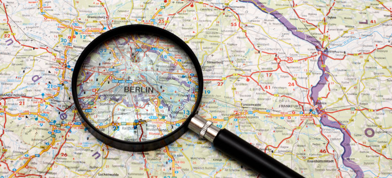A map of Berlin with a magnifier over the center of the map.